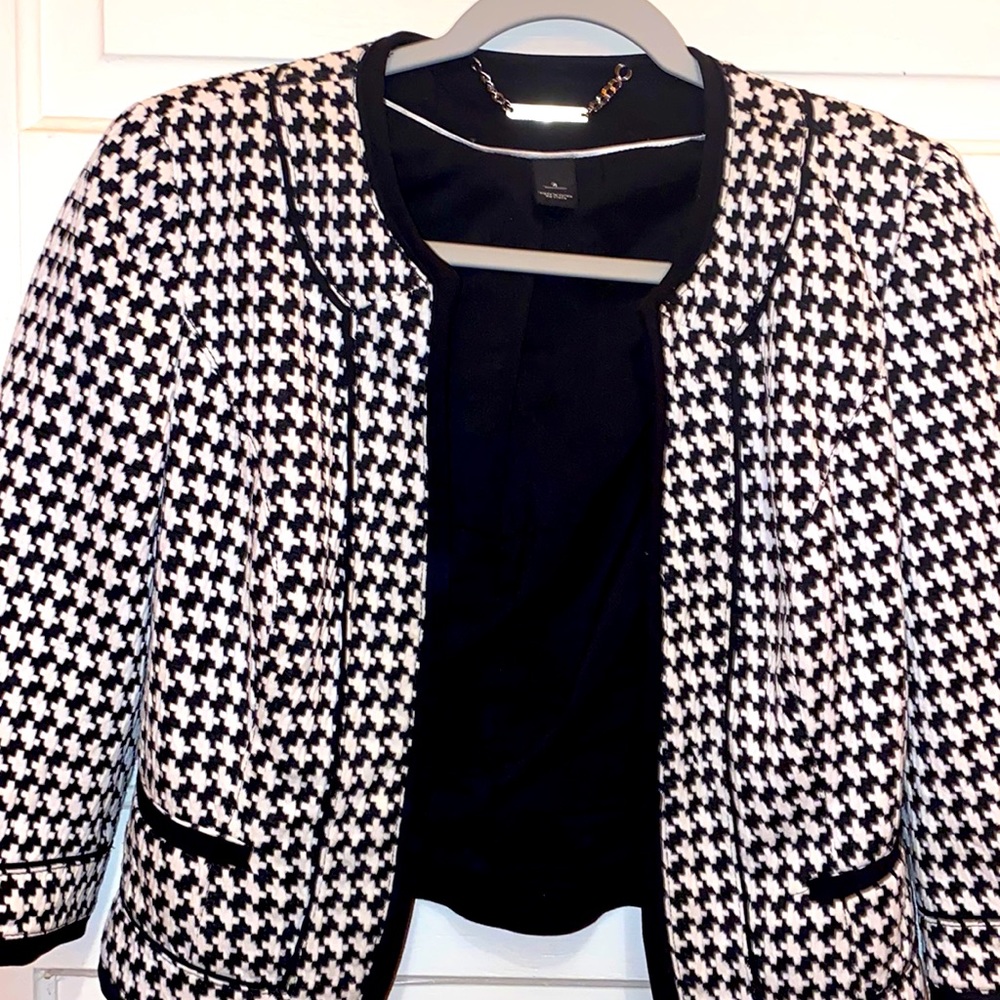 Woman’s black and white cropped blazer
